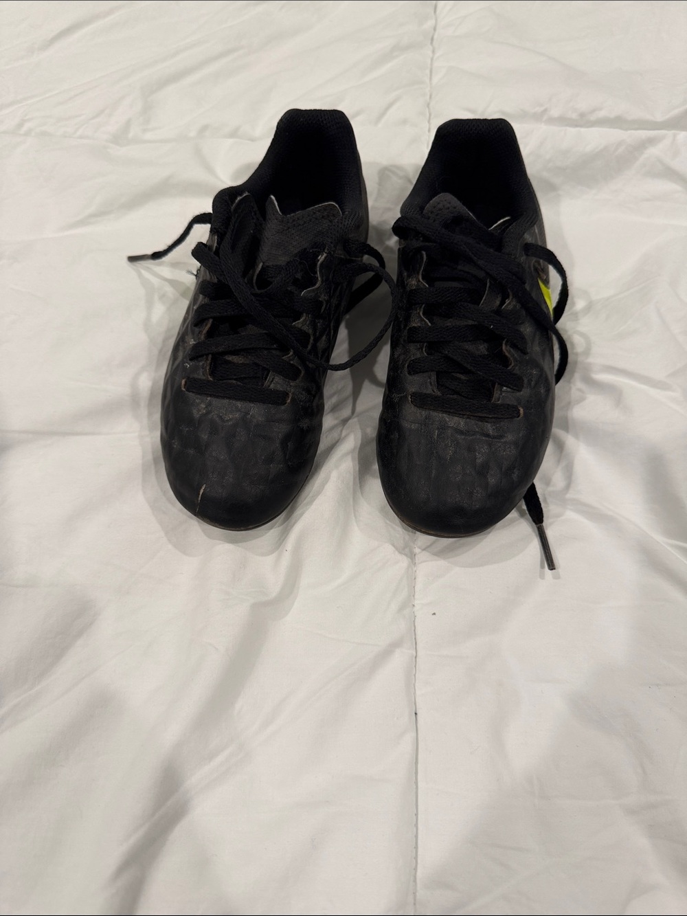 Nike Black Athletic Lace-Up Cleats with Neon Yellow Swoosh